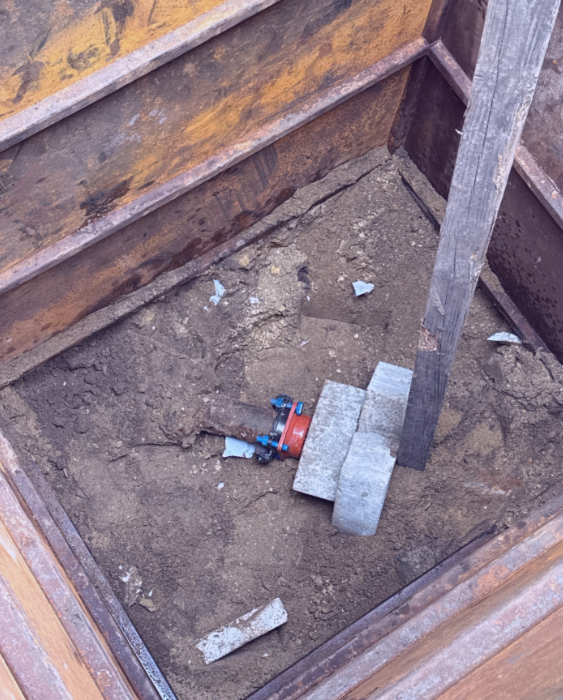 Utility disconnect work on a construction site